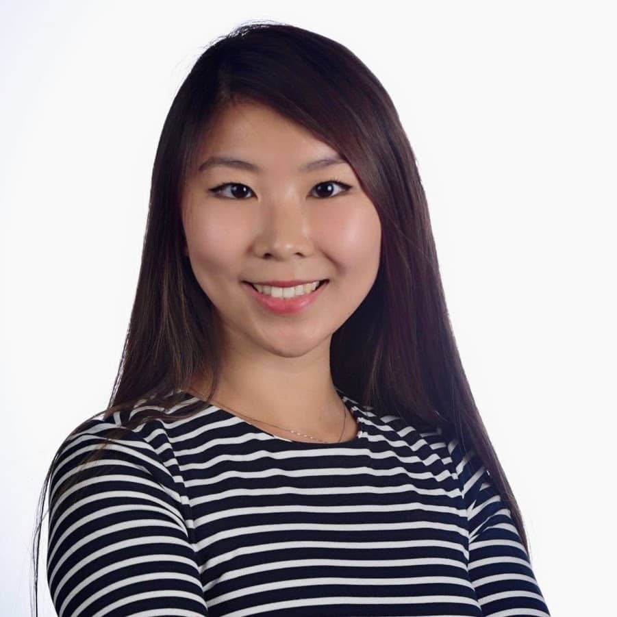 Professional headshot of Yolanda Yang, a graduate student at UNC Chapel Hill, smiling in front of a clean white backdrop.